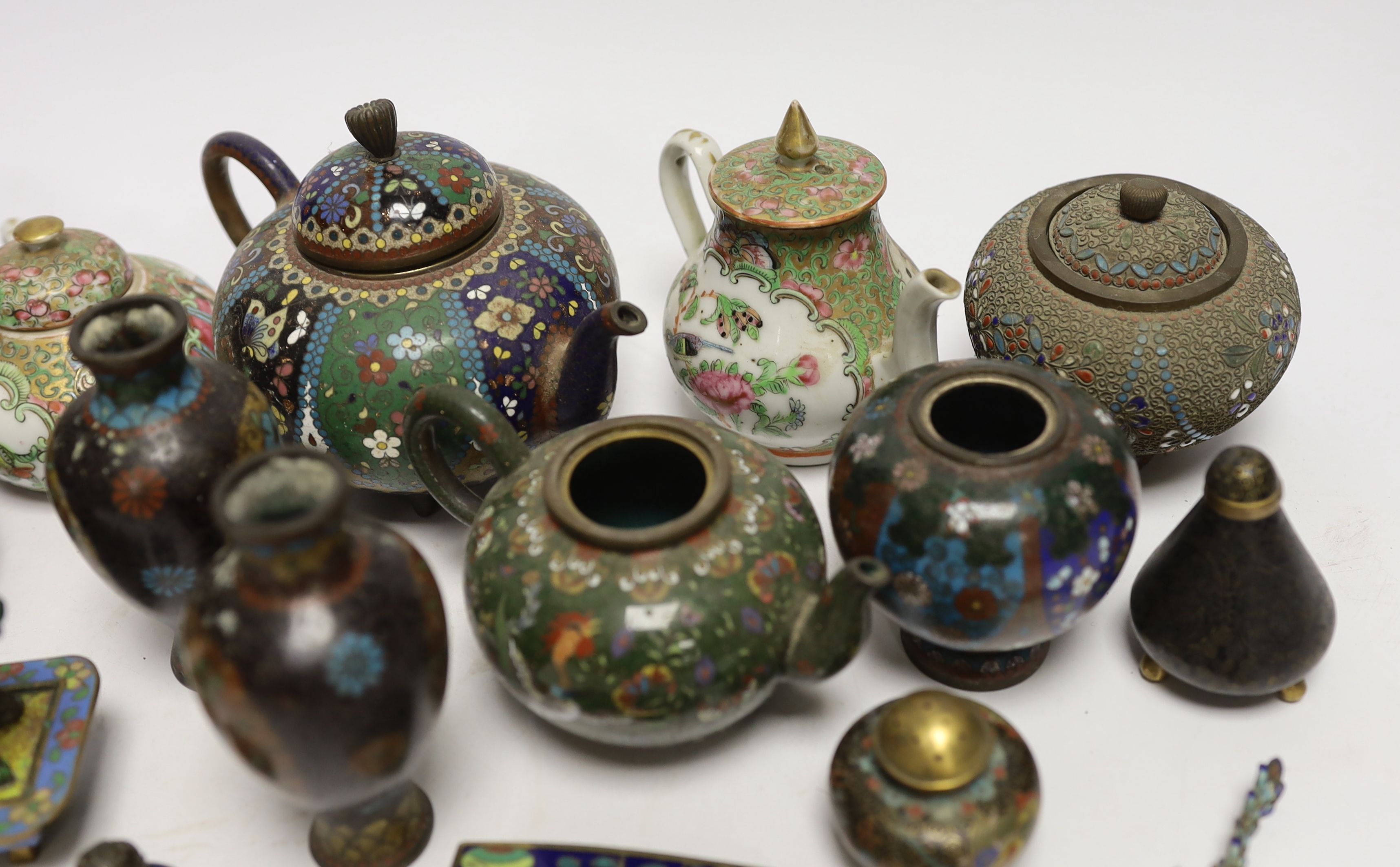 Two miniature Cantonese porcelain teapots, and a small collection of Chinese and Japanese cloisonné and champlevé enamel wares (12)